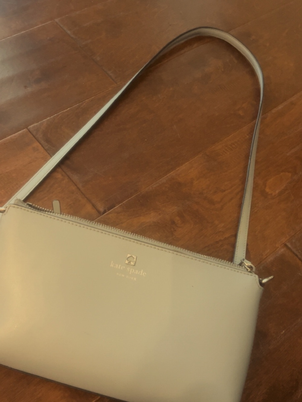 kate spade light blue leather shoulder bag with gold logo